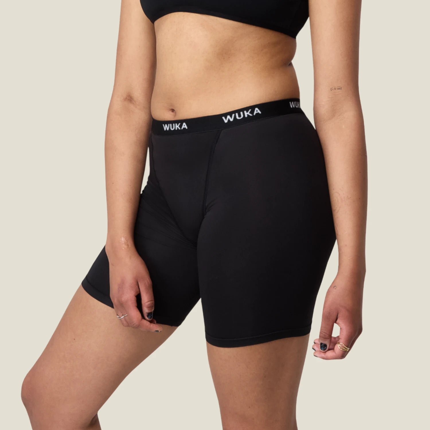 Side view of WUKA Ultimate™ Boxer Medium Flow Period Shorts showing smooth fit and body-contouring design for active period wear