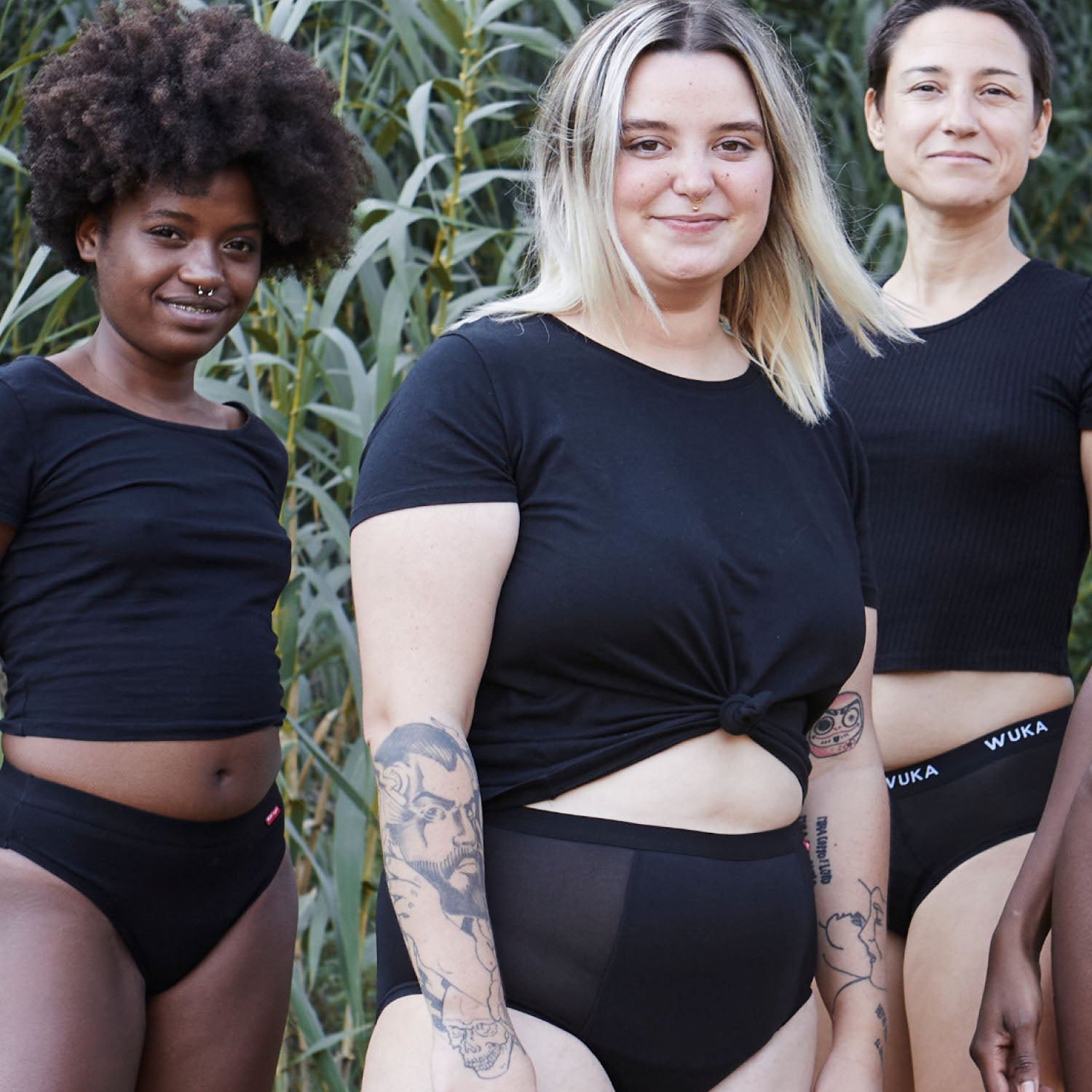 Diverse group of women wearing WUKA Ultimate™ High Waist Period Pants — period protection that’s inclusive, comfortable, and reusable